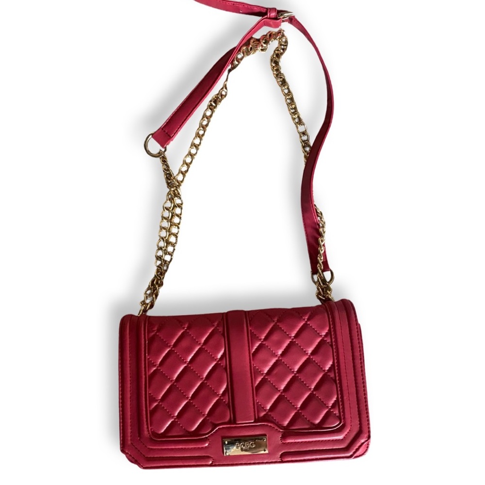 Quilted BCBG pink purse with Gold chain.